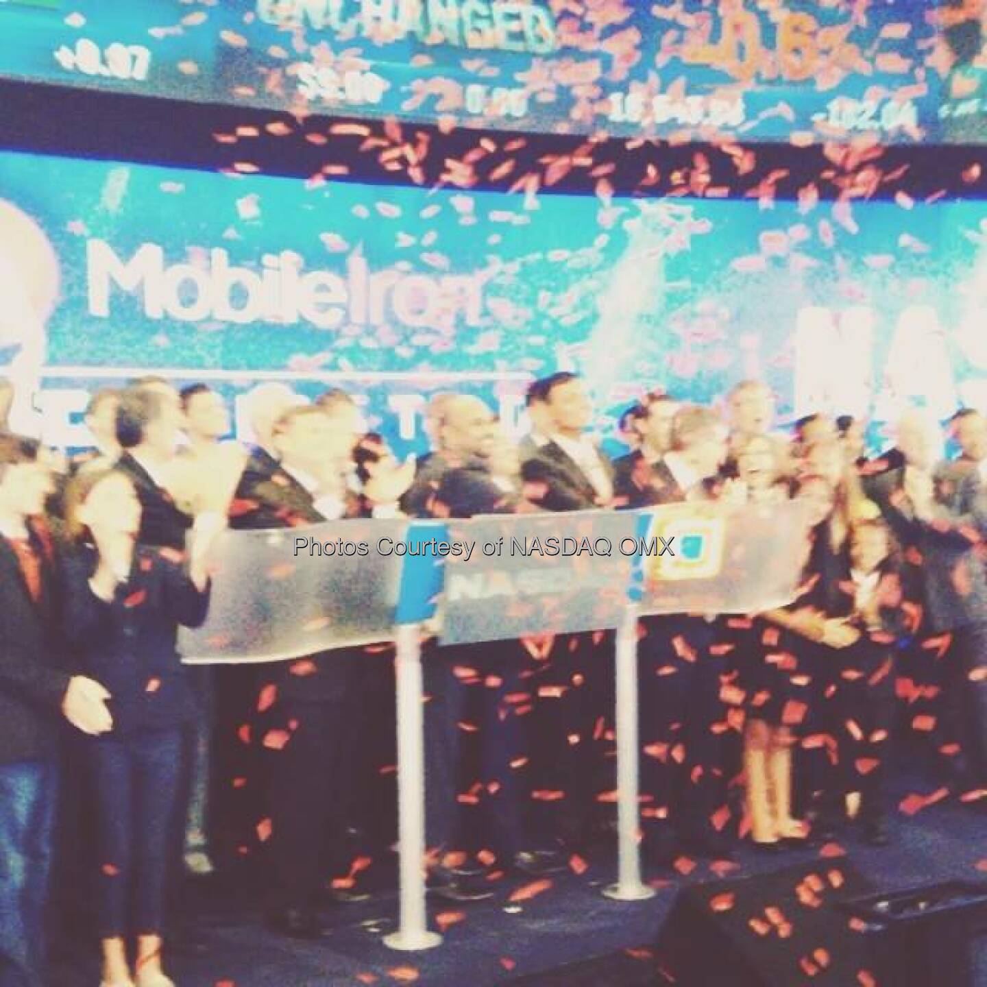Confetti flies shortly after MobileIron rings the Nasdaq Opening Bell in celebration of IPO. $MOBL  Source: http://facebook.com/NASDAQ