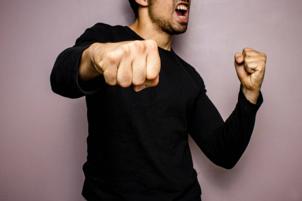 Aggression, Kampfgeist, Wut, Faust, geballte Faust, Schlag, http://www.shutterstock.com/de/pic-151024484/stock-photo-angry-man-throwing-a-punch.html , © (www.shutterstock.com) (01.07.2014) 