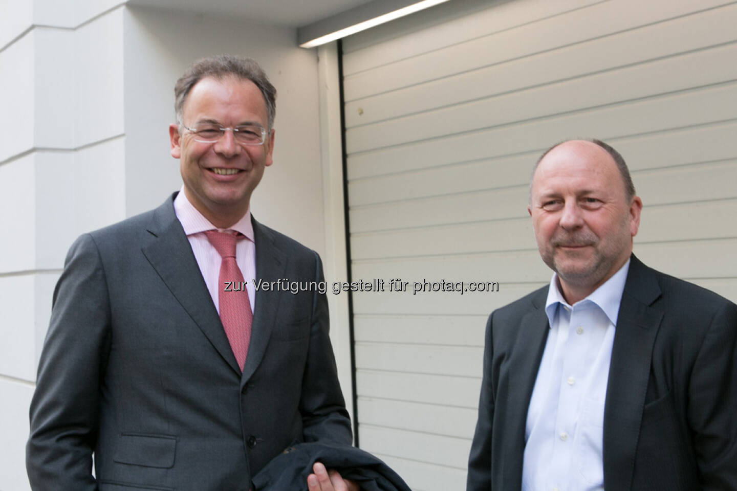 Heimo Scheuch (Wienerberger), Willy Van Riet (Wienerberger) zufällig beim Eingang Petersplatz