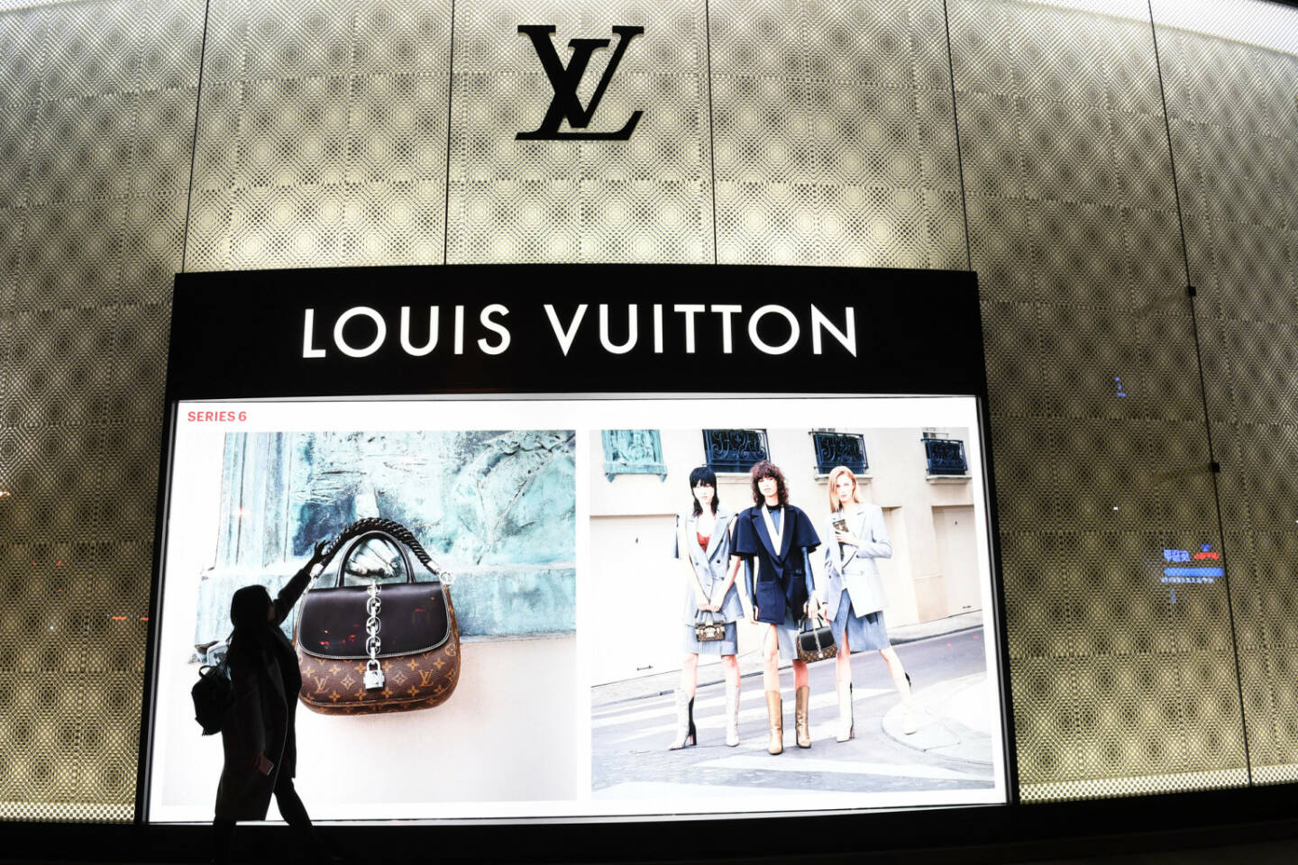 Louis Vuitton (LV) Shop, Yves Saint Laurent LVMH https://de.depositphotos.com/236193814/stock-photo-customer-walks-louis-vuitton-store.html