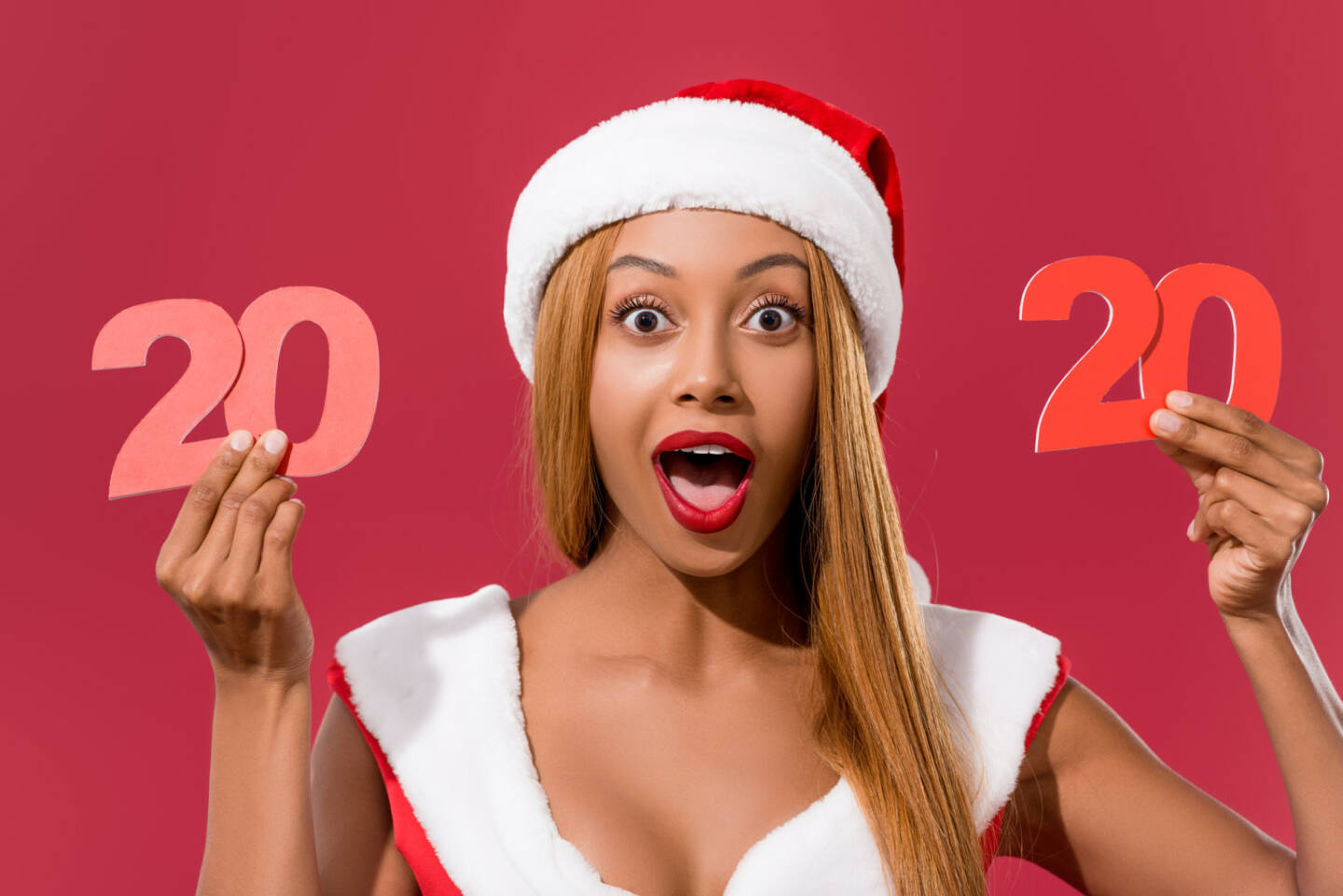 zwanzig - 20, 2020 - https://de.depositphotos.com/315117080/stock-photo-excited-african-american-girl-santa.html