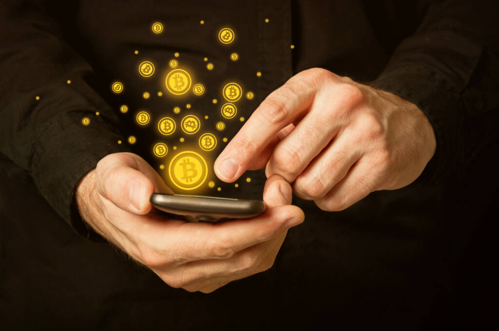Bitcoin, Smartphone, Wallet - https://de.depositphotos.com/38857381/stock-photo-bitcoins-on-smartphone.html (28.11.2019) 