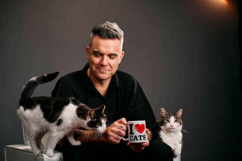 Robbie Williams ist die neue Stimme von FELIX, dem Katzencharakter und Markenbotschafter der gleichnamigen Katzenfuttermarke von Nestlé PURINA. Der neue Song des britischen Weltstars und seines tierischen Freundes wurde gestern europaweit vorgestellt und auch im Herzen von Wien präsentiert. Inspiriert von seinen eigenen Katzen, schenkt Robbie Williams in der neuen Kampagne „It‘s great to be a cat“ FELIX seine StimmeCredit: Linda Hastrich/Nestlé Purina, © Aussender (26.01.2023) 